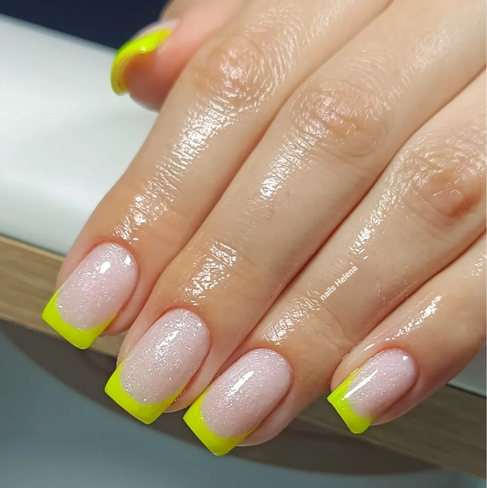 Neon french manicure by Elena, nail artist at Bond Beauty Larnaca